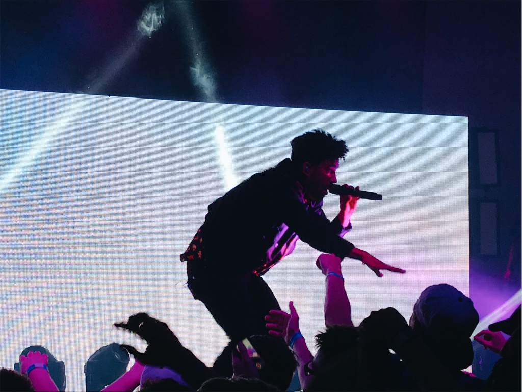 KYLE, a well-known music artist, raps on stage at his concert on Wednesday, April 19th at the Bourbon Theatre in downtown Lincoln. The SUPER tour consisted of the opener, Cousin Stizz, and the main event KYLE, and will make their next stop in Denver, CO at the Cervantes’ Ballroom. Photo by Maggie Wilson.