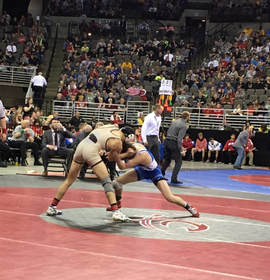 Maxx Mayfield competes against Omaha Burke’s Joey Harrison in state final competition on February 18, 2017 at the Centurylink Center.  