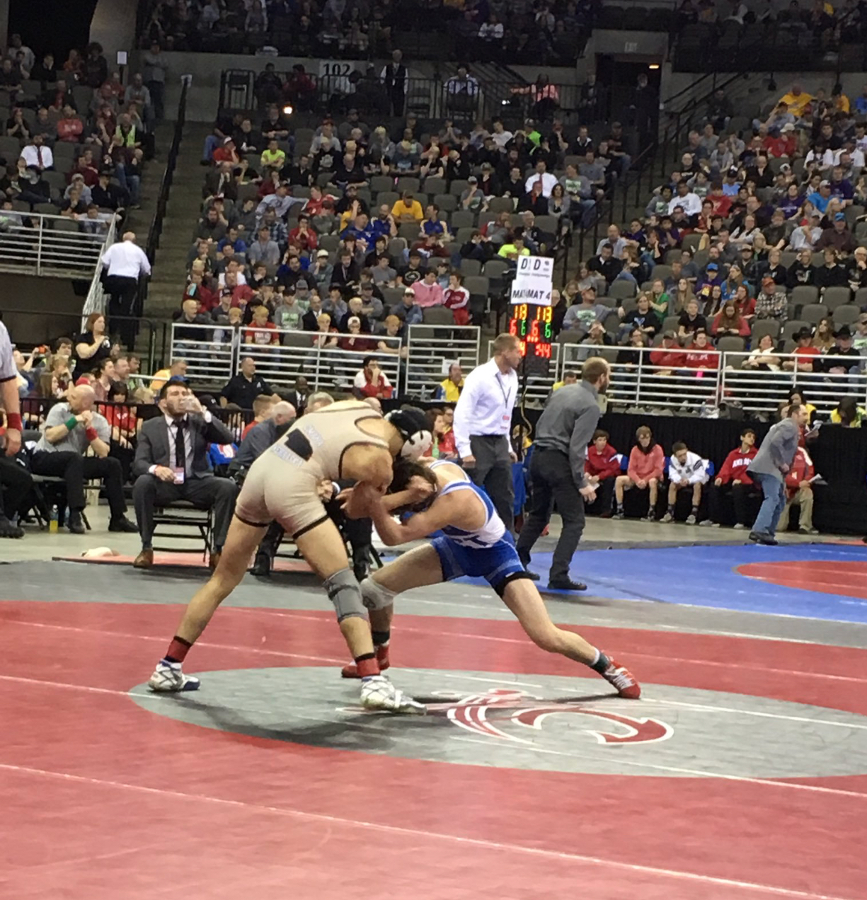 Maxx Mayfield competes against Omaha Burke’s Joey Harrison in state final competition on February 18, 2017 at the Centurylink Center.