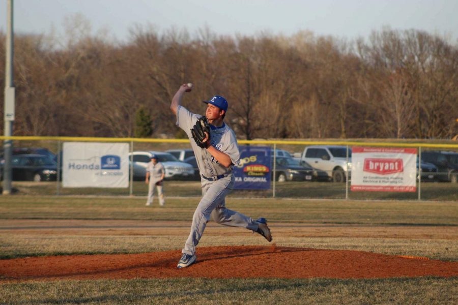 Senior Zane Busekist pitches against Lincoln North Star on April 10 at Densmore Field.