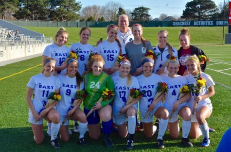 Senior girls on the varsity soccer team poses for a photo on senior night