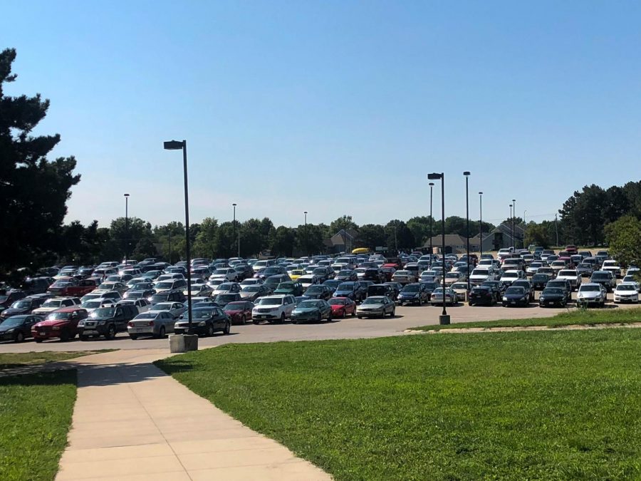 Cars fill the East High parking lot. Increased enrollment has resulted in heavy traffic and a full parking lot for 2018.
