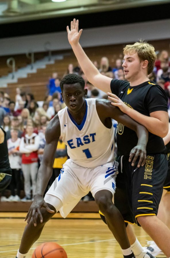 Teny Gakdeng works his way to the basket in the 63-40 win over Fremont on Thursday night.
