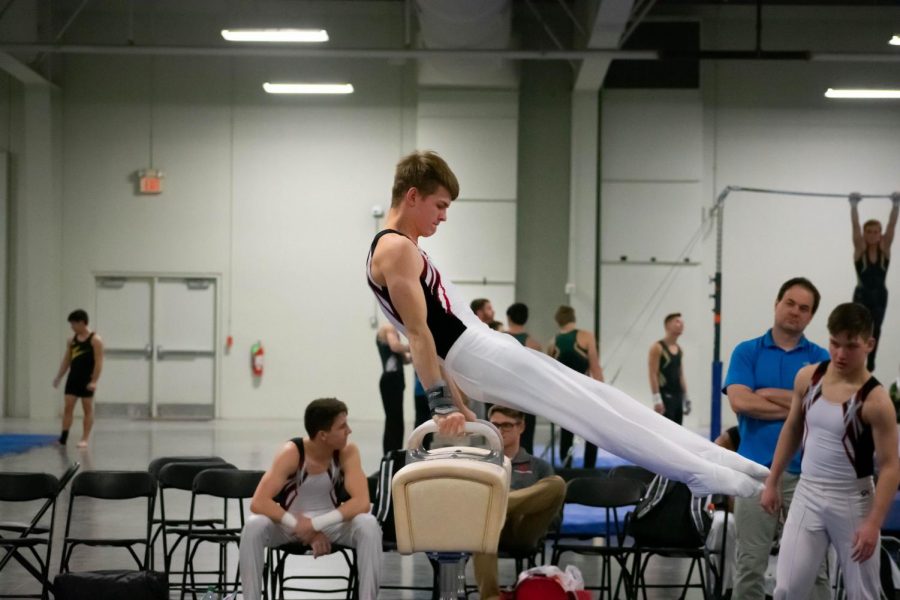 Lincoln East freshman Blaine Loll competes on pommel horse at a gymnastics meet in Kansas City on January 26. Loll competes for Nebraska School of Gymnastics. 