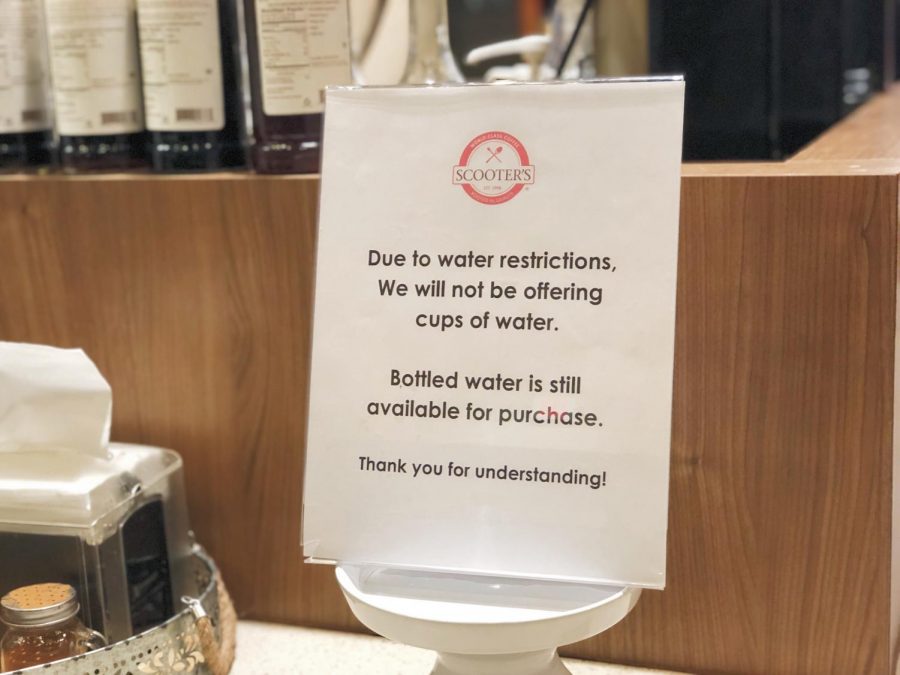 Scooters Coffee at 84th and Rockledge has a sign here in place of the typical water container. The sign was posted in correspondence with the mandatory restriction that went into effect Sunday night.