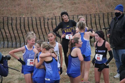 The Lady Spartans celebrate with one another after finding out they have won the state title.