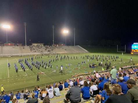 The Lincoln East Varsity Marching Band performs their show, Boy Band Legacy, for halftime at a football game.