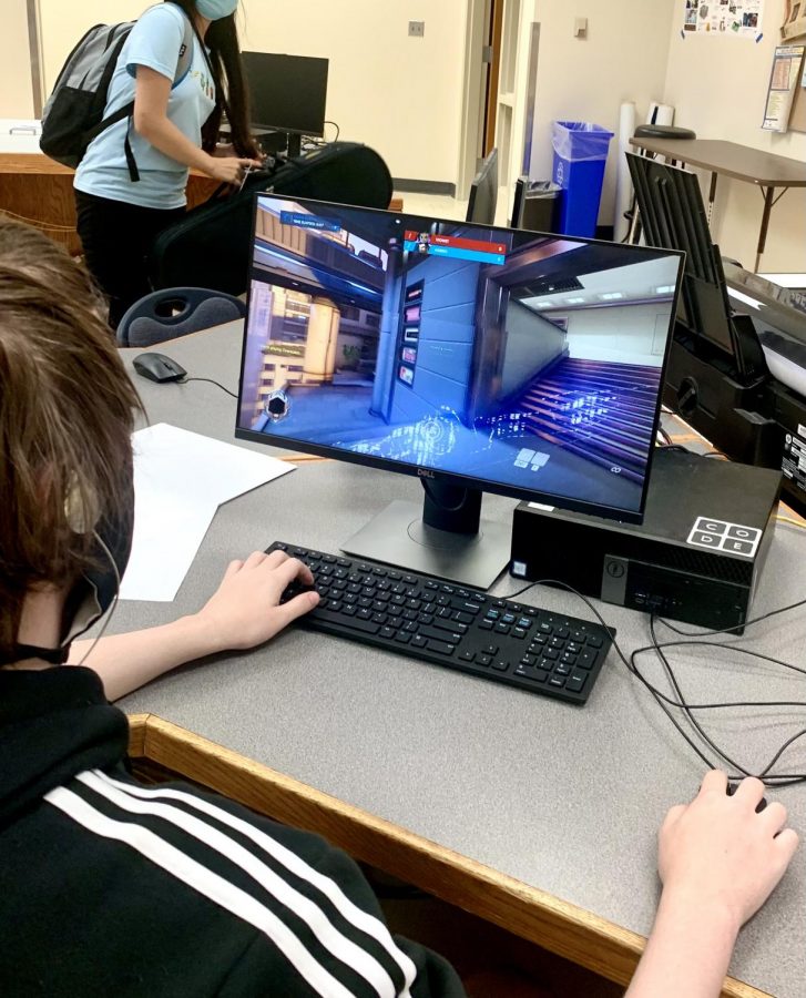 Colin Nelson (junior) playing Overwatch on September 9th afterschool in the Spartan ESports Club. The people around him are playing Hartstone, Rocket League, and Overwatch.