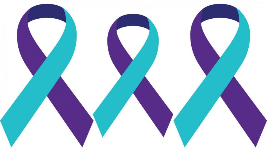The purple and turquoise ribbons of National Suicide Prevention Month.