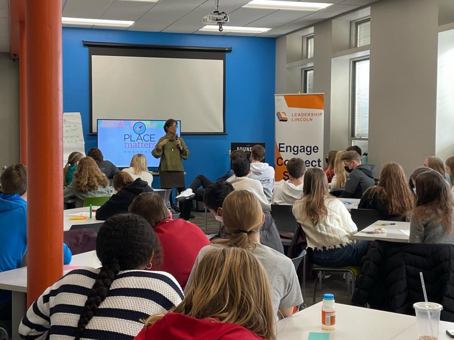 Youth Leadership Lincoln cohort 25 listening to Lori Seibels, CEO and President of the Community Health Endowment, presentation on Friday, November 19, 2021.