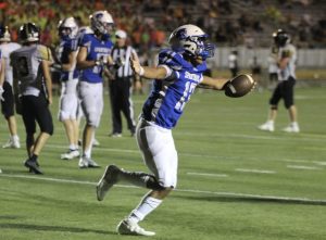 On September 2nd, 2022 the Lincoln East varsity football team defeated the Southeast Knights 21-14. Sophomore quarterback Jeter Worthley celebrates his third touchdown of the night.
