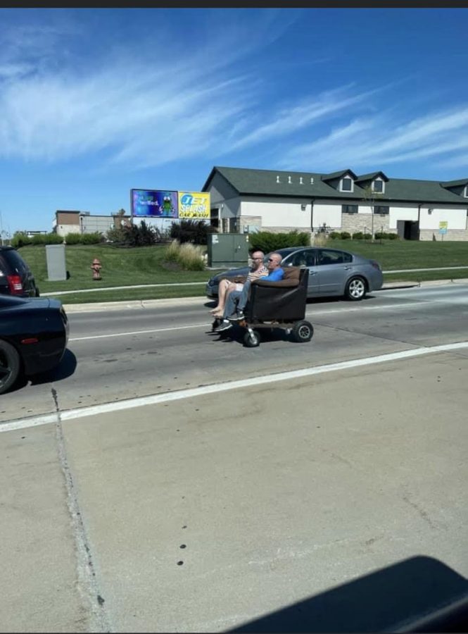 The two men driving the couch down a Lincoln road outside a carwash Saturday afternoon, September 24, 2022. The men had been spotted by several witnesses driving around a parking lot, drive-through, and grocery store.