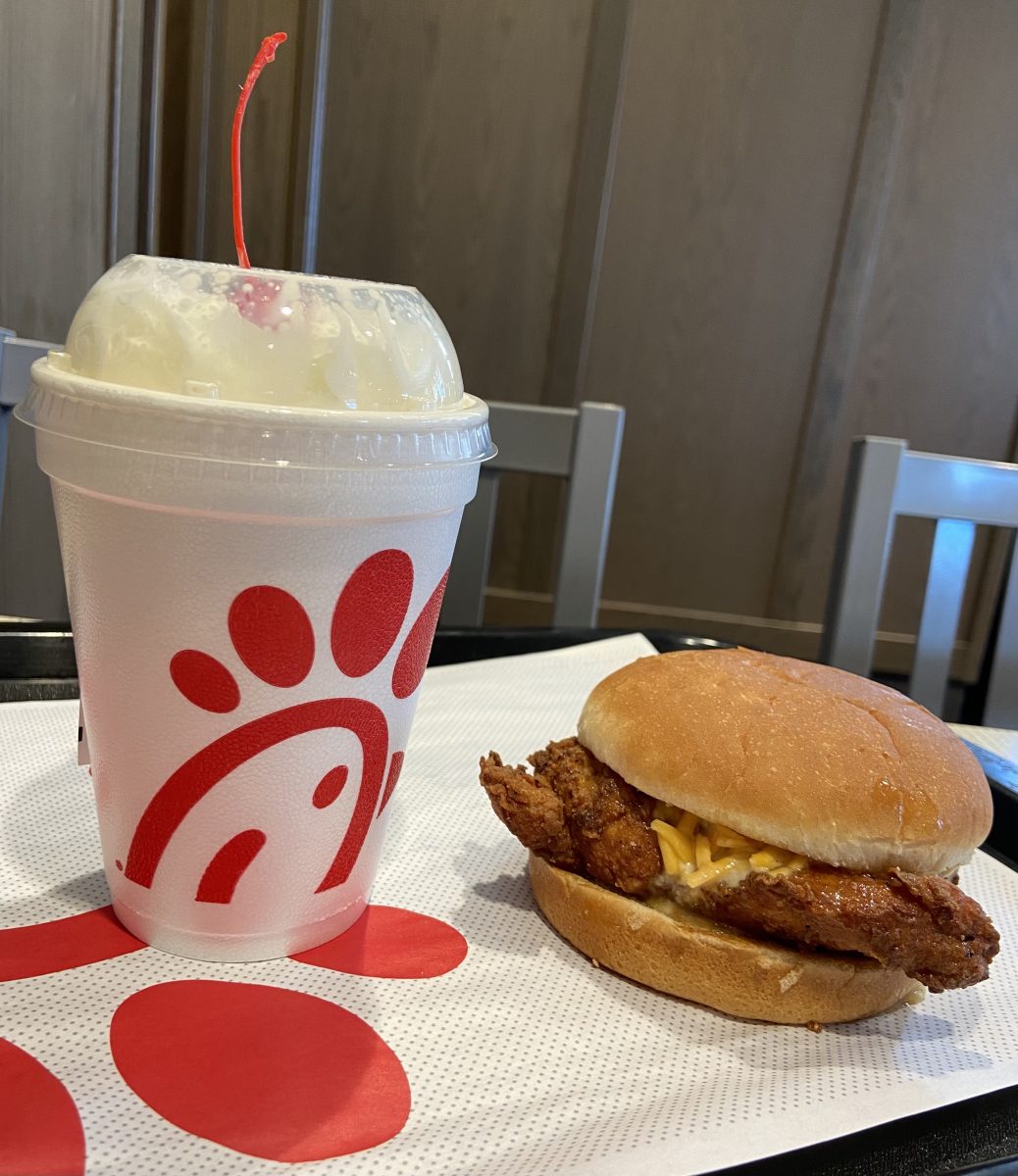 The Original Honey Pepper Pimento Chicken Sandwich next to The Caramel Crumble Milkshake. Taken at the O-Street Chick-fil-A in Lincoln during lunch time.