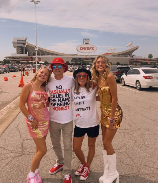 The Joyce family poses in their Eras tour outfits in front of the Arrowhead stadium on July 7, 2023. Its a common theme for fans to choose a Taylor Swift era from one of her albums to dress up as.
