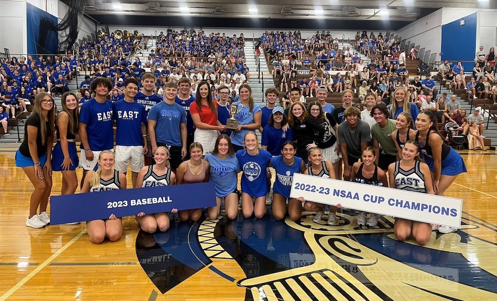 Current Spartans involved in athletics and activities that aided the Spartans to the NSAA cup victory for the 2022-2023 victory celebrate at Booster Blitz. This was the Spartans second straight title.