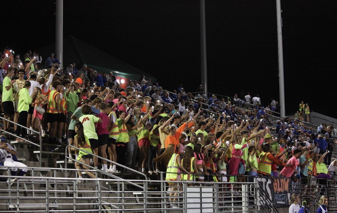 The student section accurately reflects how students feel about Spartan football at the September 14 game against Northeast. Neon is a popular and reoccurring theme at East since its so easy to participate.