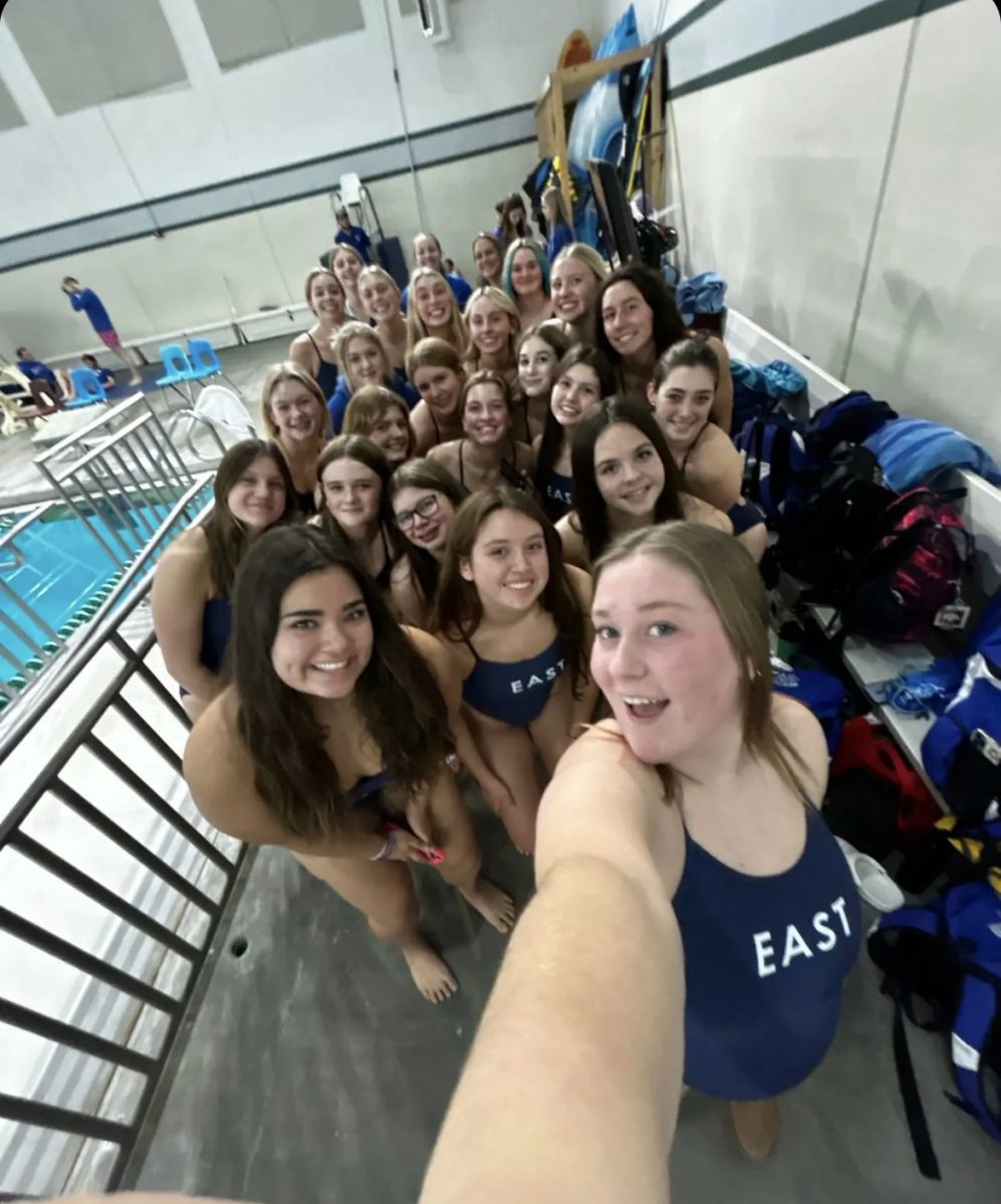 Lincoln+Easts+girls+swim+team+takes+a+picture+before+their+dual+against+Lincoln+Southwest+on+Thursday%2C+November+30th%2C+2023.+The+girls+made+sure+to+include+everyone+in+the+photo%2C+no+matter+what+grade+or+ability+level.