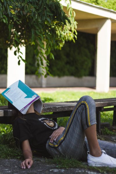 Exhaustion, lethargy, and the lack of willingness or motivation often felt as an effect of senioritis can make it increasingly difficult for students to focus on or complete tasks as the semester goes on.  Photo by Tony Tran, and licensed under Unsplash License.