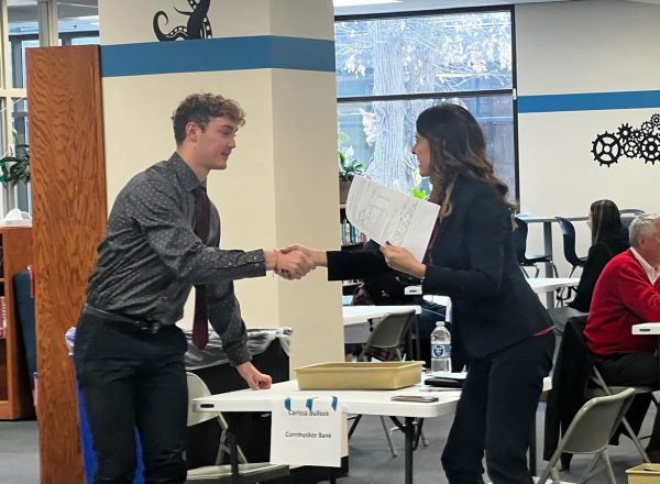 Braxton Frederick, junior, shakes hands with his interviewer after completing his mock interview on March 27, 2024. The mock interview assignment is assigned to help prepare students for future job interviews, and teach them the skills they need to be successful in their future job search. 