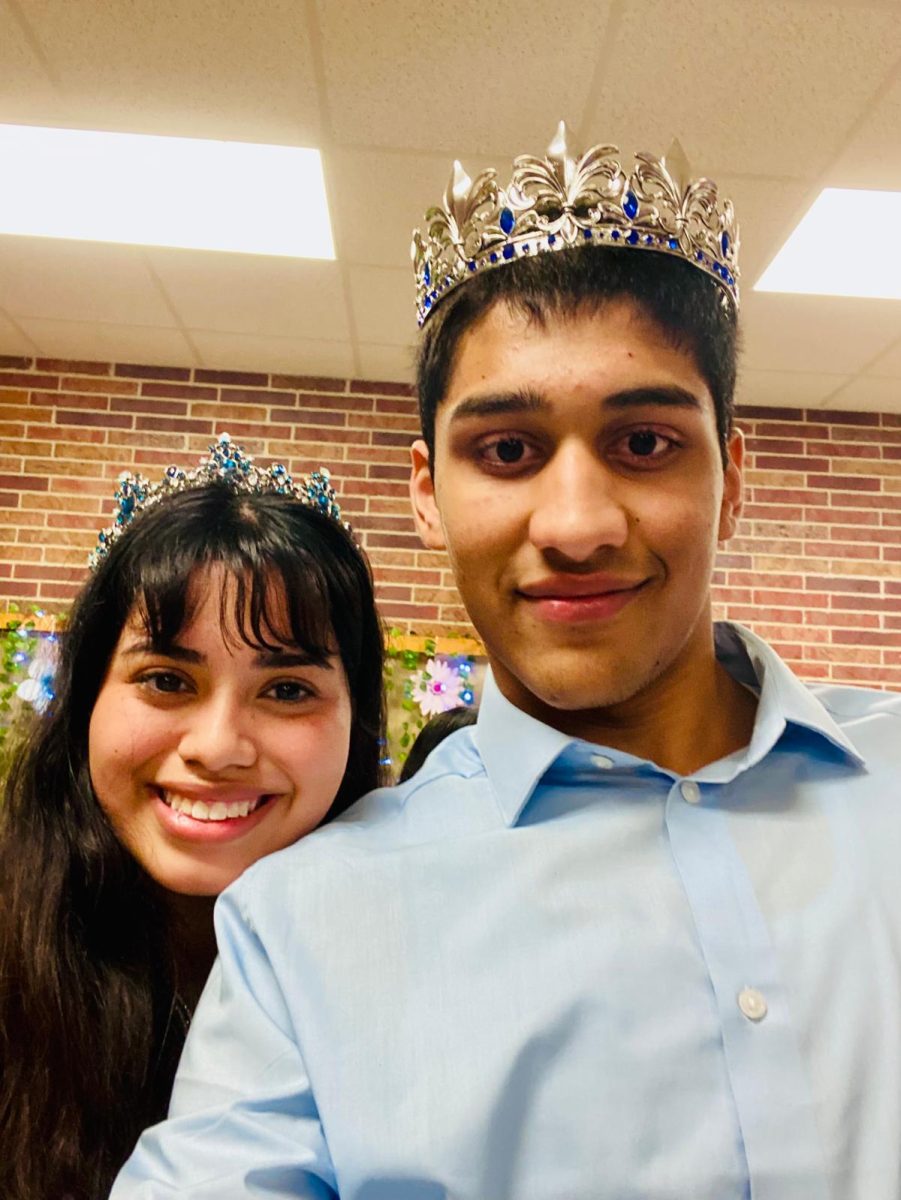 On Friday, September 13, 2024, at Lincoln East High School, Eloisa Swinehart and Mueen Mahmood mark the moment they win homecoming royalty. The King and Queen styled their crowns after being voted by East seniors.