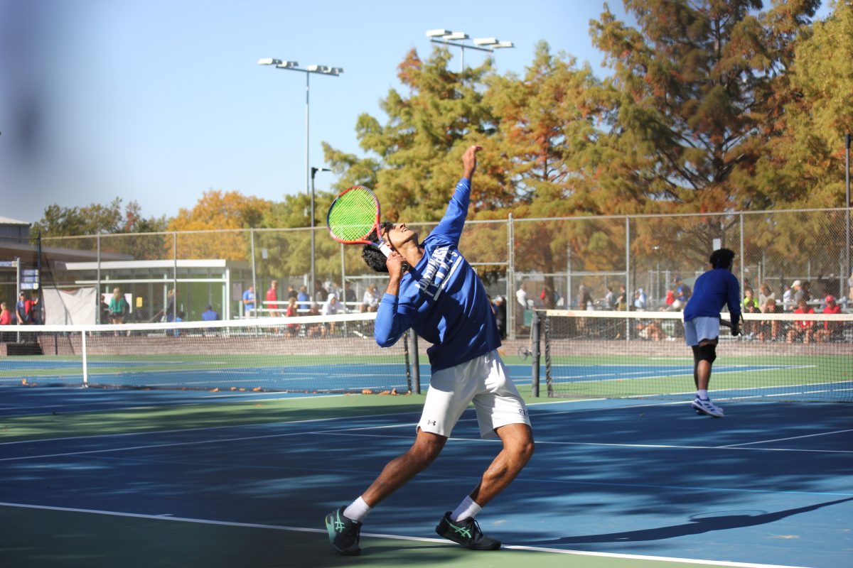 Samarth Sajeesh serves the ball during his final 1 doubles match against Creighton Prep at the NSAA Boys Tennis State Championship on Tuesday, October 22, 2024 at Woods Tennis Center. Sajeesh and partner Caden Haar won the match and helped the Spartans claim their fourth straight State title.