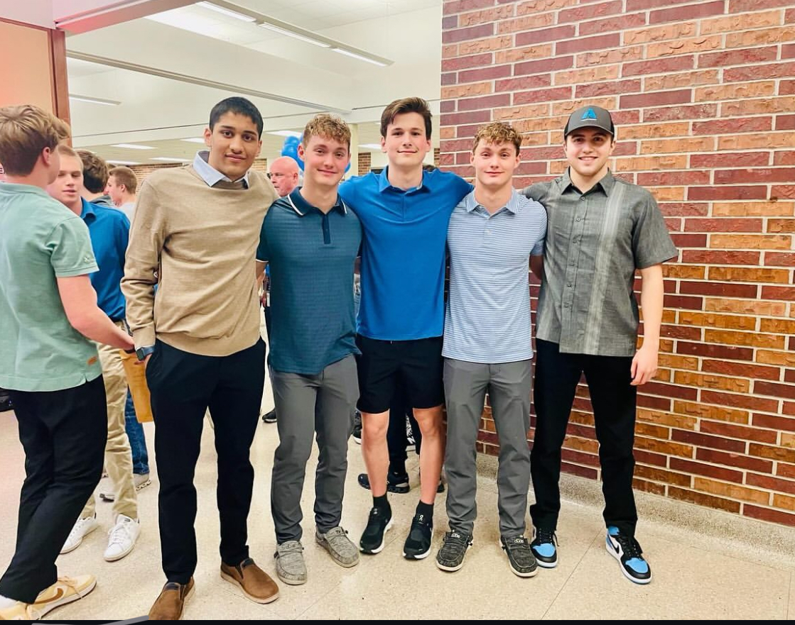 Mueen Mahmood (L) and his swim team friends,  Braxton Frederick, Mason Kassebaum, Reid Frederick, and Calum Krikac (R) finish the 2023-24 swim season up as State Runner-Ups, at the swim team banquet.