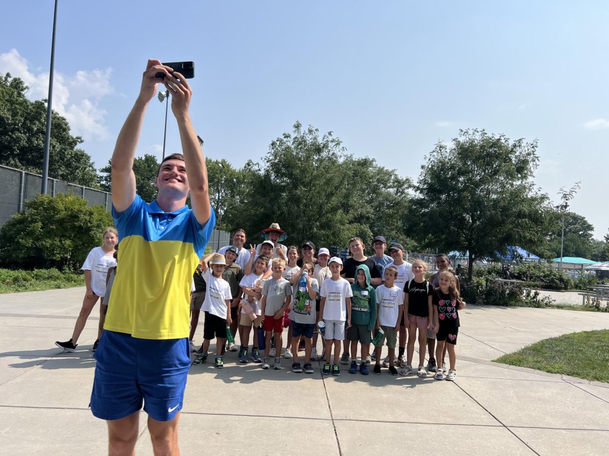 Mykhailo Ivashchenko, Ukranian native and Lincoln tennis coach hosts a Ukranian tennis camp for 31 middle school age children at Woods Tennis center. Not only does he work hard in the tennis community, he works to organize fundraisers and drives for Ukraine while researching as a PhD student to help with medical care back home.