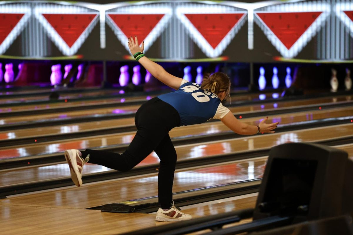 Lincoln East junior Tristan Yates rolls a bowling ball down the alley at the 2025 district bowling tournament. Yates has worked hard this season and her hard work has paid off as she was one of three girls from her team to qualify for state. 