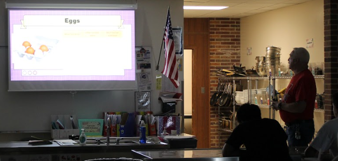 Chuck Morgan teaches his 5th period Culinary 1 class about the big 8 food allergies. Morgan was hired to teach human development and culinary for the 2025-26 school year.