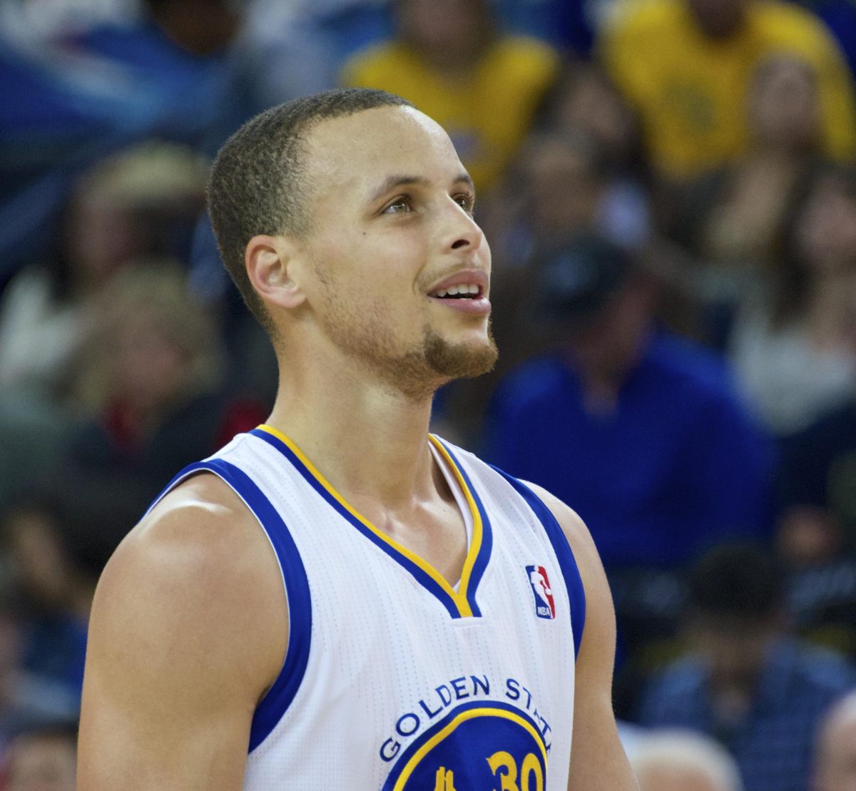 Steph Curry pausing mid-game, looking at the scoreboard. Curry played his 16th season for the Golden State Warriors in the 2024 season. 