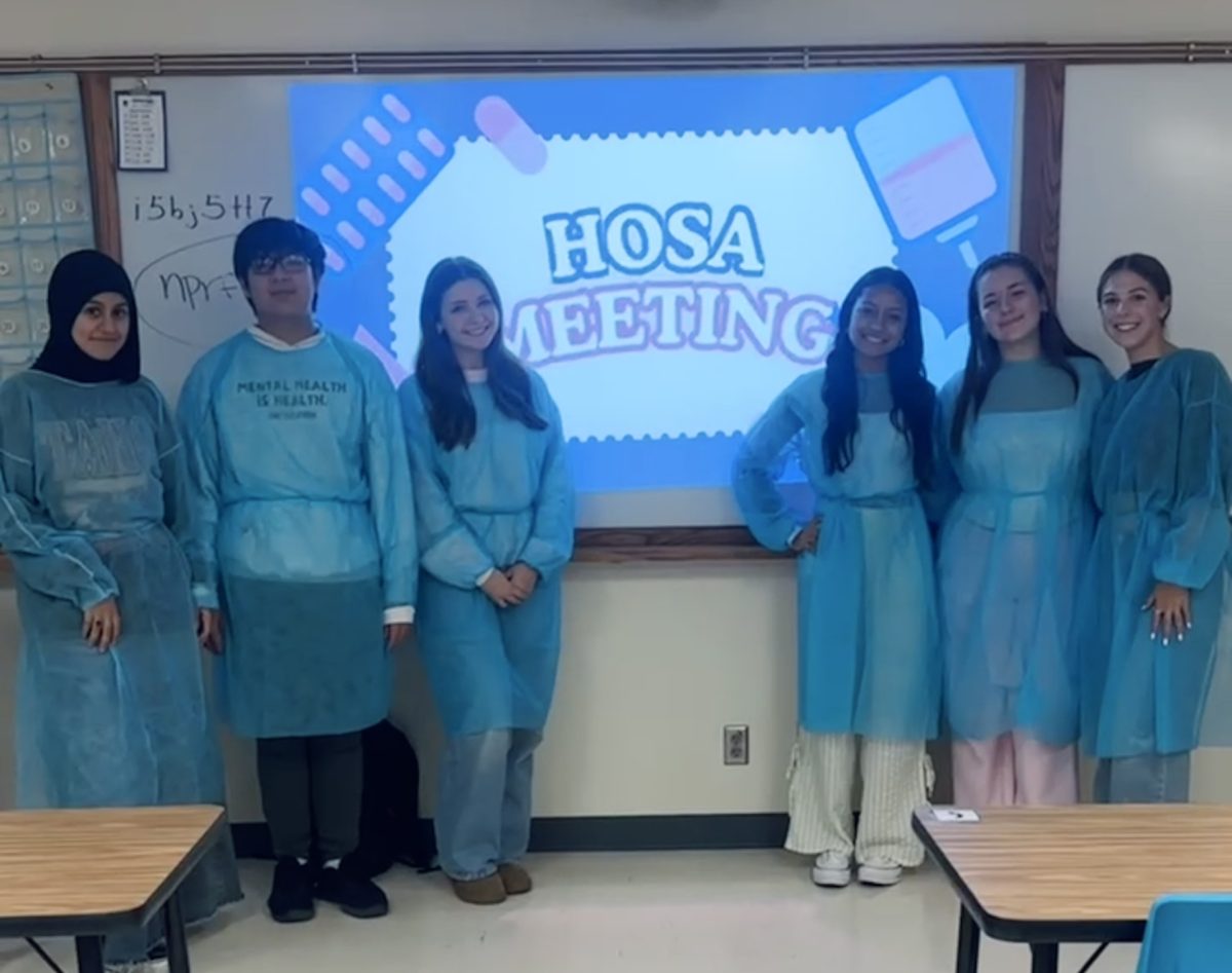 The HOSA officer team (L-R) Zahraa Aljabiry, vice president of recruitment, Evan Ngo, vice president of records, Cecilia Cary, president, Risha Gumudavalli, president elect, Mia Crawford, vice president of outreach, and Lauren Rallis, event coordinator.