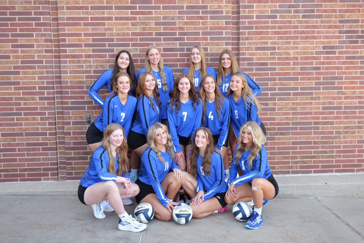 The East varsity volleyball team is happy to win their game against the Columbus Discoverers on September 23, 2025, at Lincoln East High School. The players faced a lot of pressure as the end of the season approached.