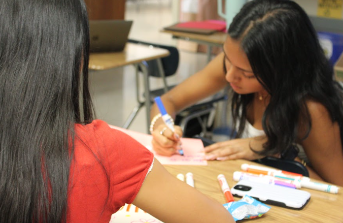 Members of the Lincoln East Red Cross Club make cards to give to Bryan hospital on September 25, 2025. The new club has already made tons of cards to spread positivity with card making being a frequent fun activity of the club.