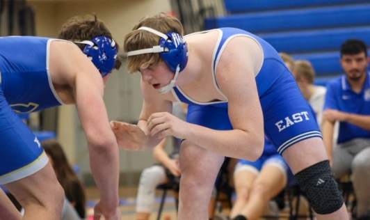 Junior wrestler and football player Joe Waegli wrestles in a duel. The Lincoln East Boys Wrestling team won the State Duals and placed second at State in the 2024-25 season.