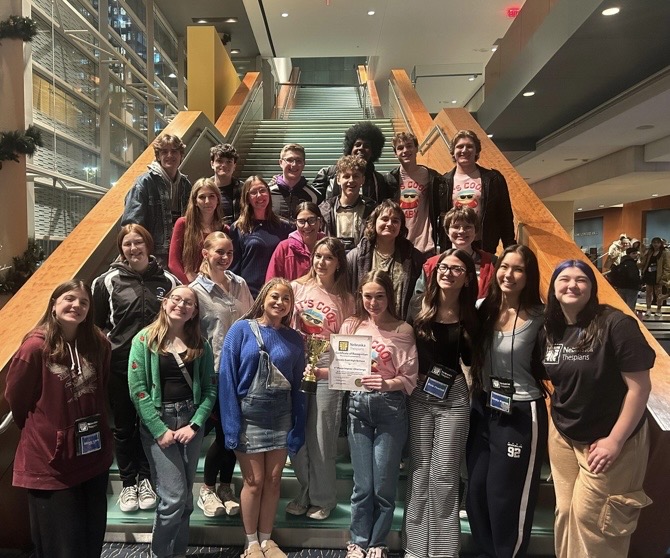Thespian Troupe 3185 smiles after closing ceremonies took place Saturday, January 10, 2026 at the Holland Center. The group posed with their first place trophy. 