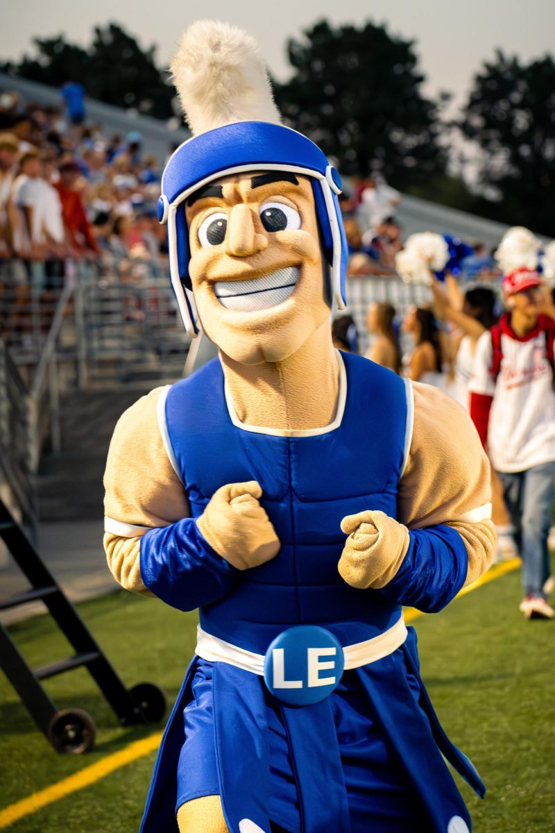 Martin the Spartan smiles wide and clenches his fists in determination during an exciting football game. Martin continued to go above and beyond while showing his school spirit for the rest of the game.